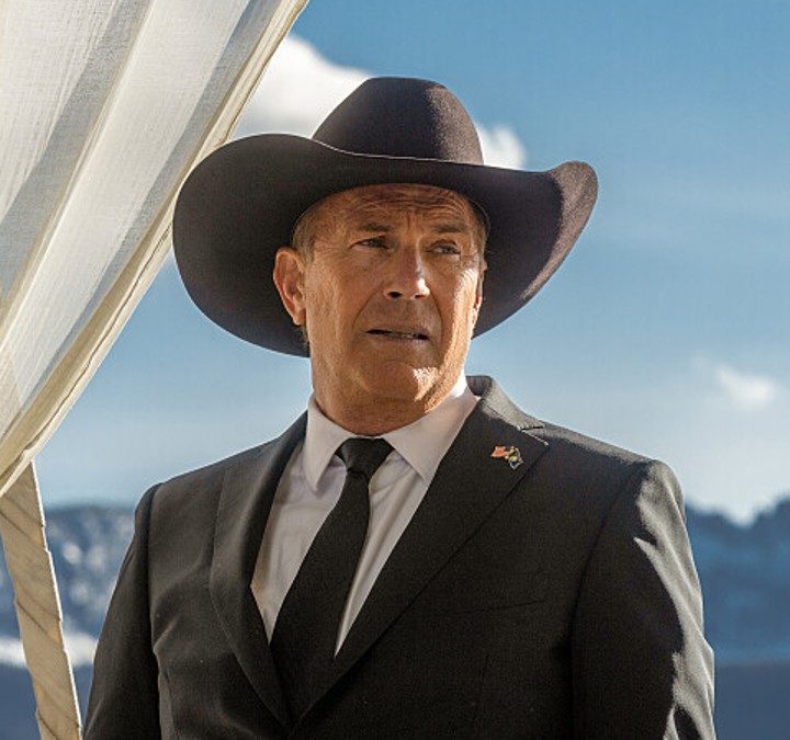 Kevin Costner staring into the distance in a scene from Yellowstone.