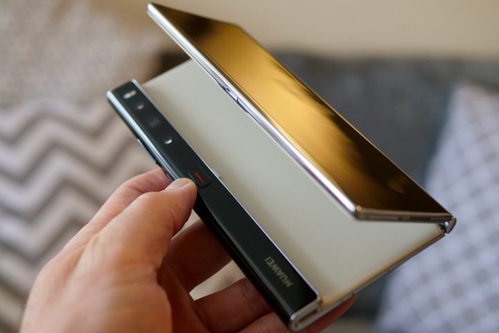 Opening the Huawei Mate Xs 2 using the button.