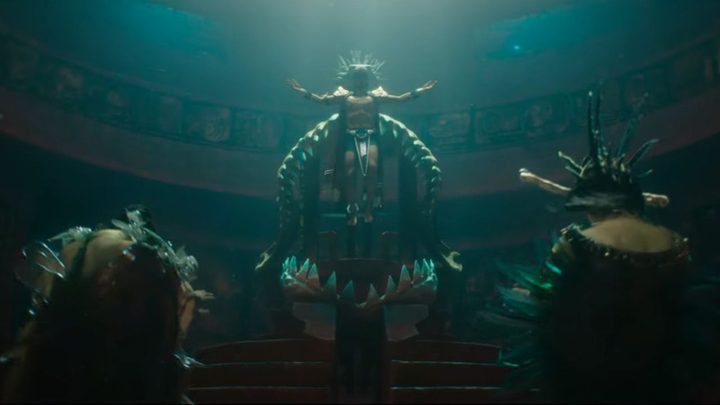 Namor descending to his throne in the underwater city of Talokan in Black Panther: Wakanda Forever.