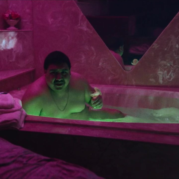 A man sits in a tub from in a scene from All Jacked Up and Full of Worms.