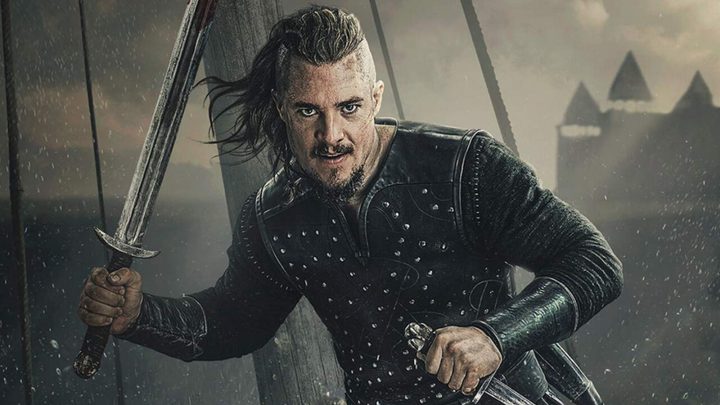 Uhtred with his sword in hand in The Last Kingdom promo art.