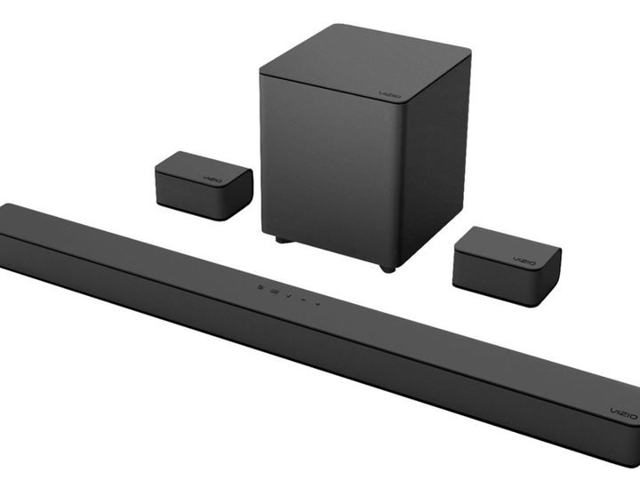 The Vizio 5.1-channel V-Series soundbar and included subwoofer and speakers against a white background.