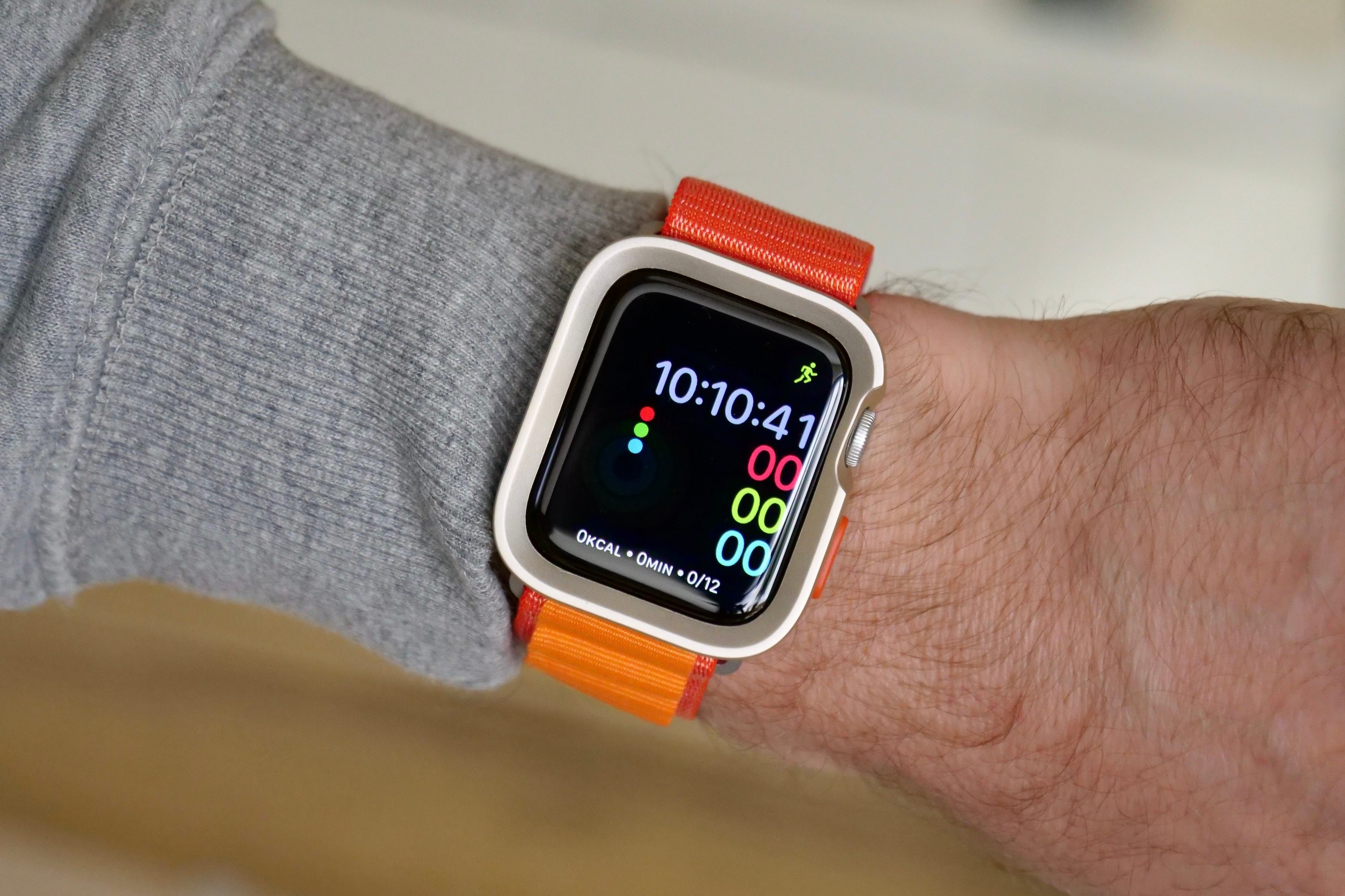 Apple Watch SE 2 with protective case and generic Alpine Loop-style strap.