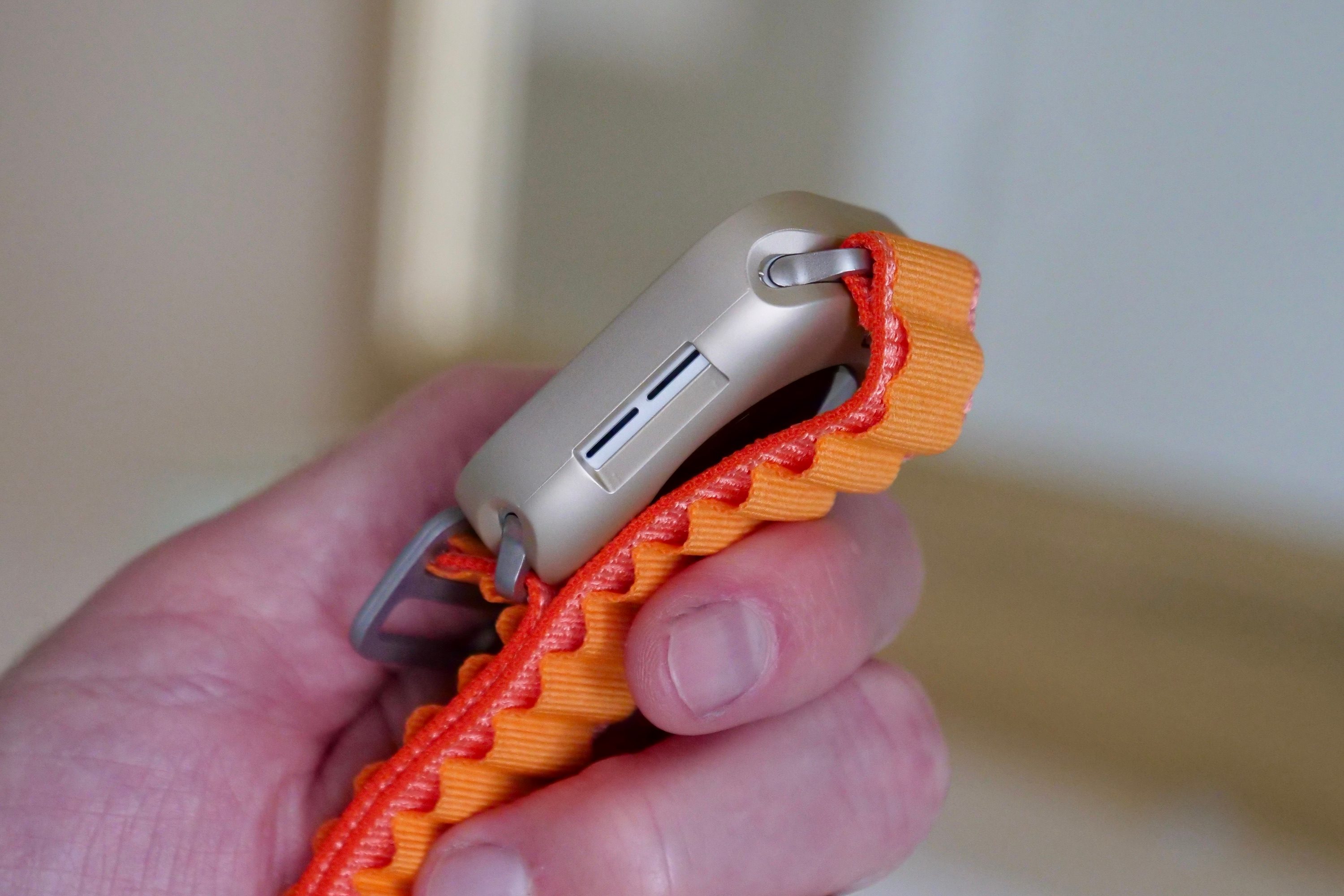 The side of the Apple Watch SE 2 in a protective case.