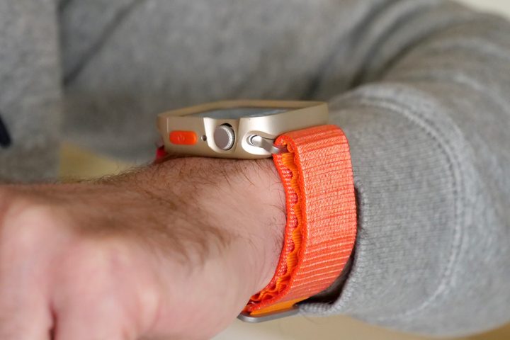 Apple Watch SE 2 with protective case and generic Alpine Loop-style strap.