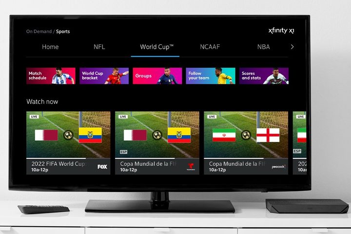 A TV showing the Comcast Xfinity interface for World Cup 2022 coverage.