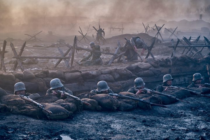 Soldiers in the trenches in All Quiet on the Western Front.
