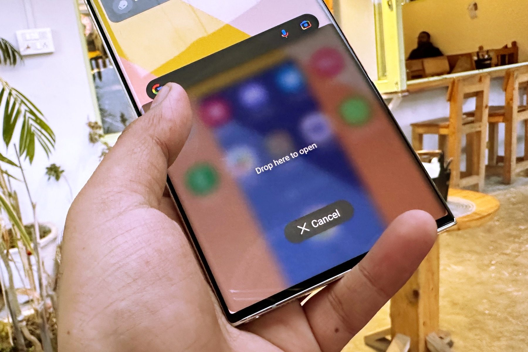 Drag and swipe up to open app on Samsung Galaxy S22 Ultra.
