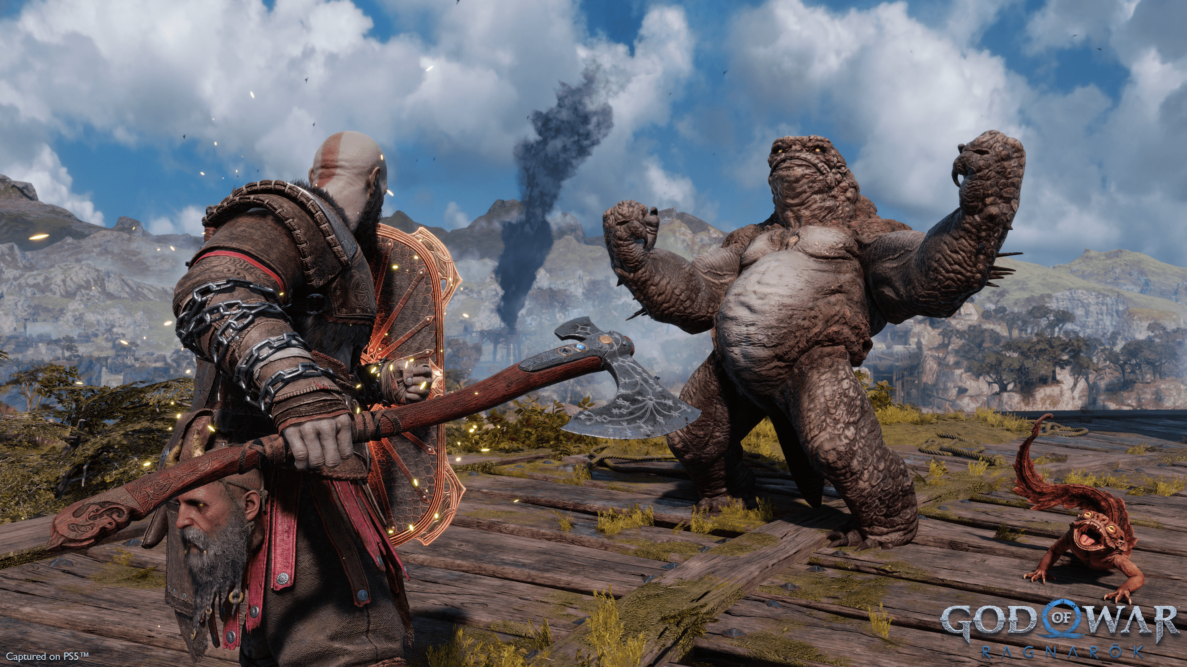 Kratos faces off with a monster in God of War Ragnarok.