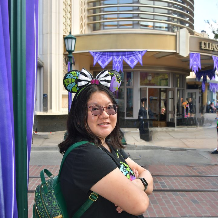 Christine side view pose at DCA with Magic Eraser used to eliminate background people.