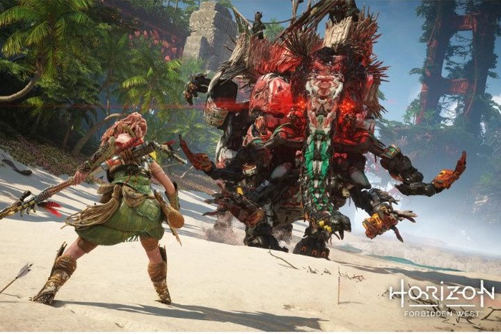 Aloy battles a robot dinosaur in Horizon: Forbidden West.