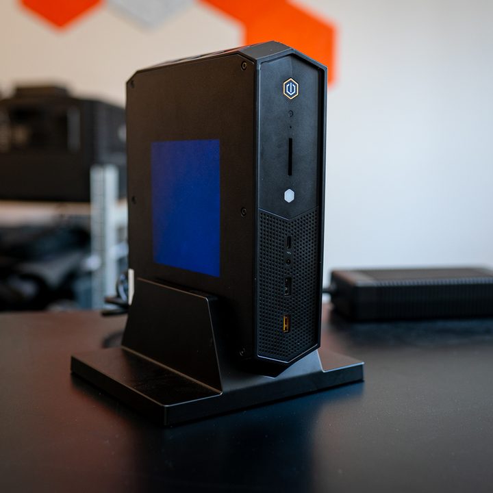 Intel NUC computer on a table.
