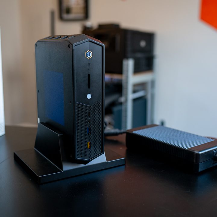 Intel NUC 12 Enthusiast sitting on a desk.