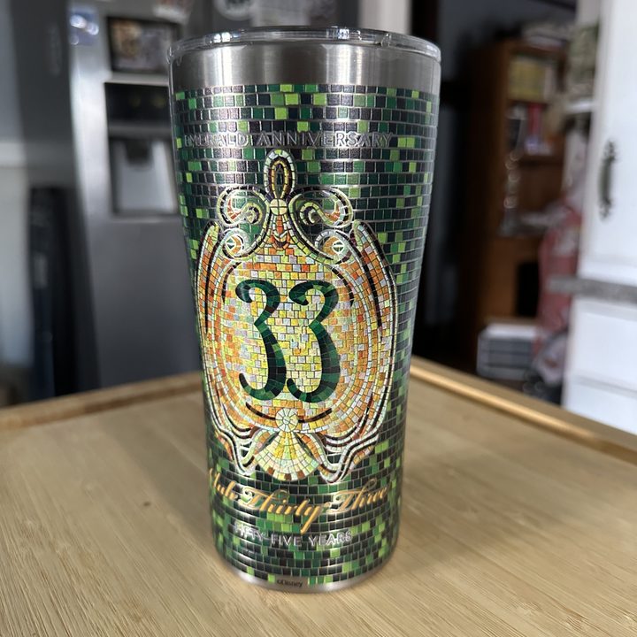 Club 33 Emerald Anniversary travel mug taken with iPhone 14 Pro