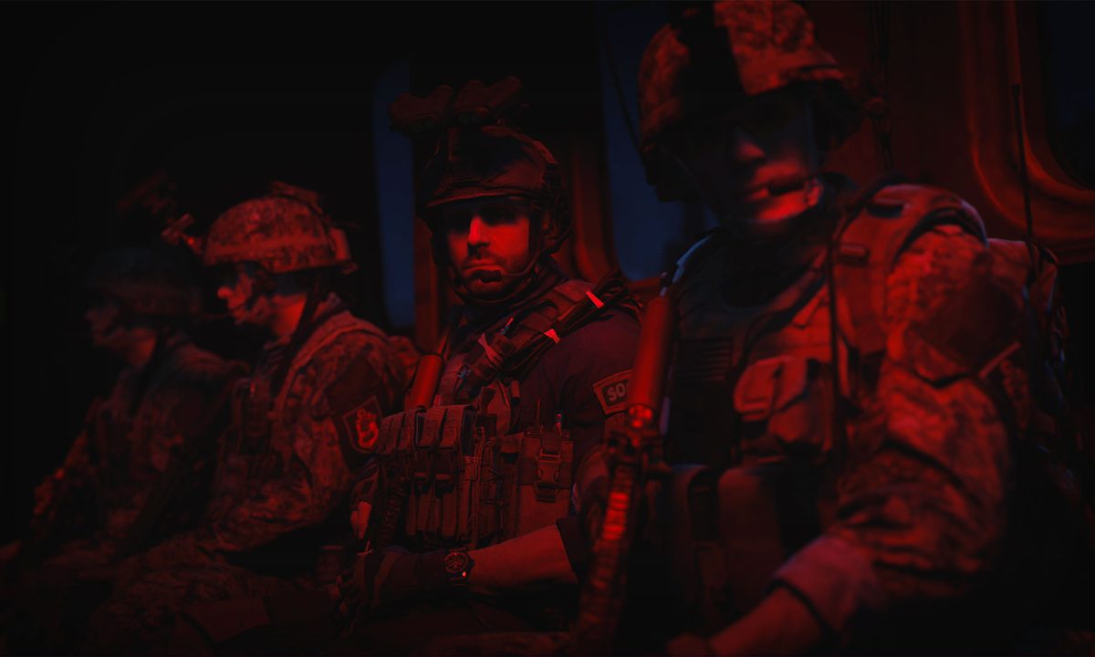 Soldiers in a a helicopter.