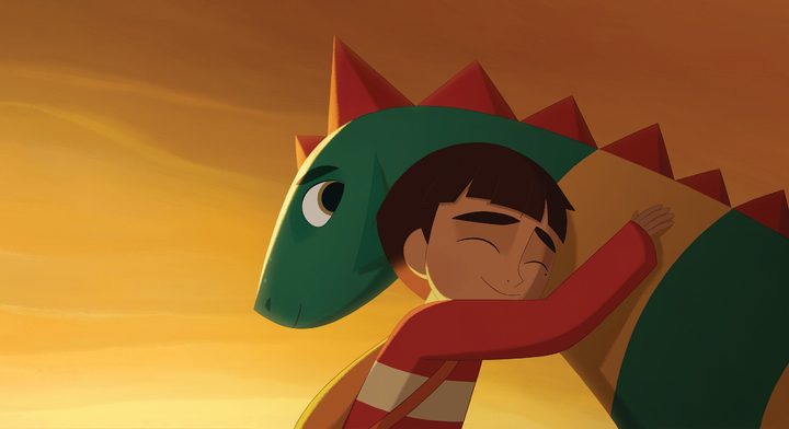 A boy hugs his pet green dragon in My Father's Dragon.