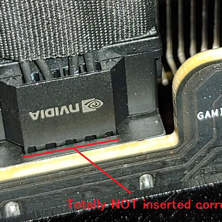 A close-up of a power cable inserted into the RTX 4090 GPU.
