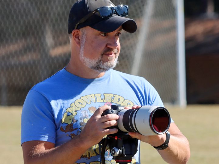 Phil Nickinson with a camera and cool T-shirt.
