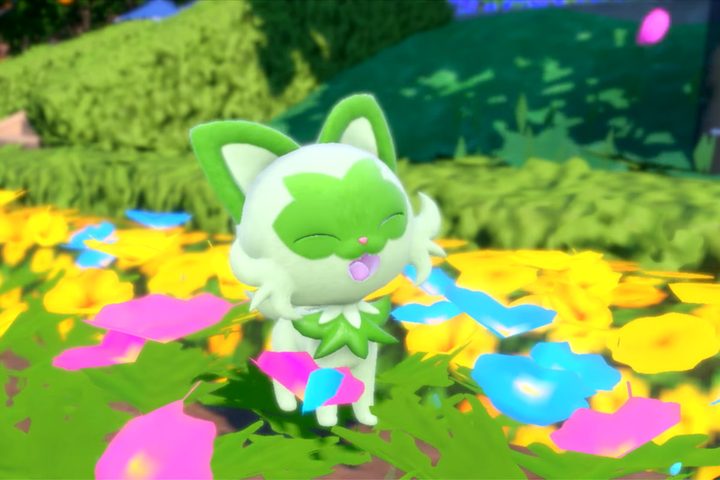 Sprigatito smelling flowers.