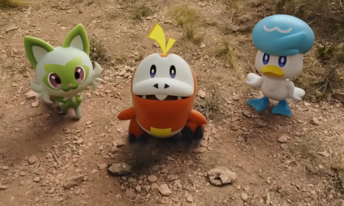 Sprigatito, Fuecoco, and Quaxly in a trailer.