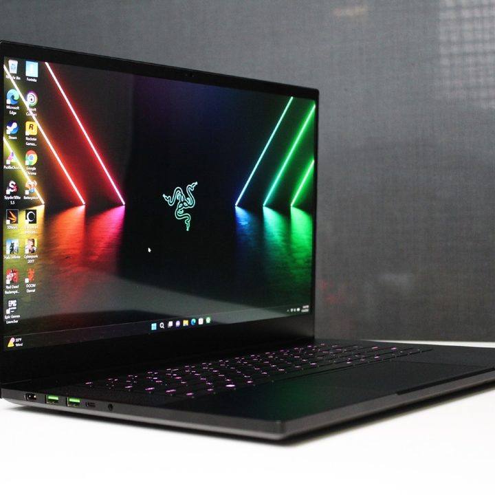 The Razer Blade 15 OLED on a white table.