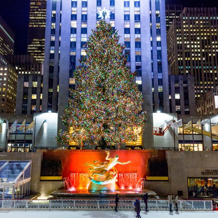 A Christmas tree is lit at Rockefeller Center.