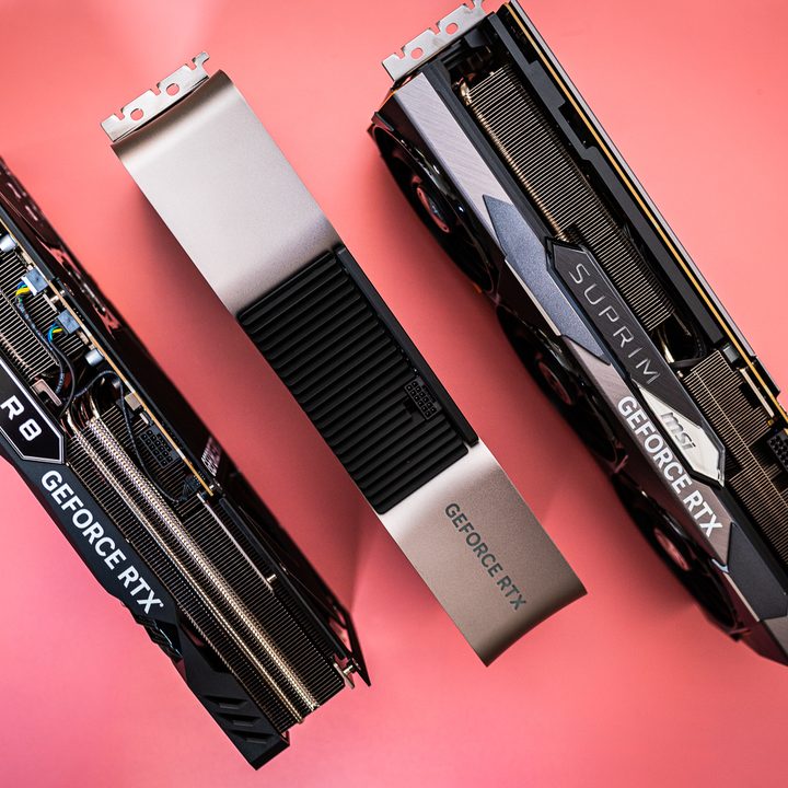 Three RTX 4080s sitting side-by-side.