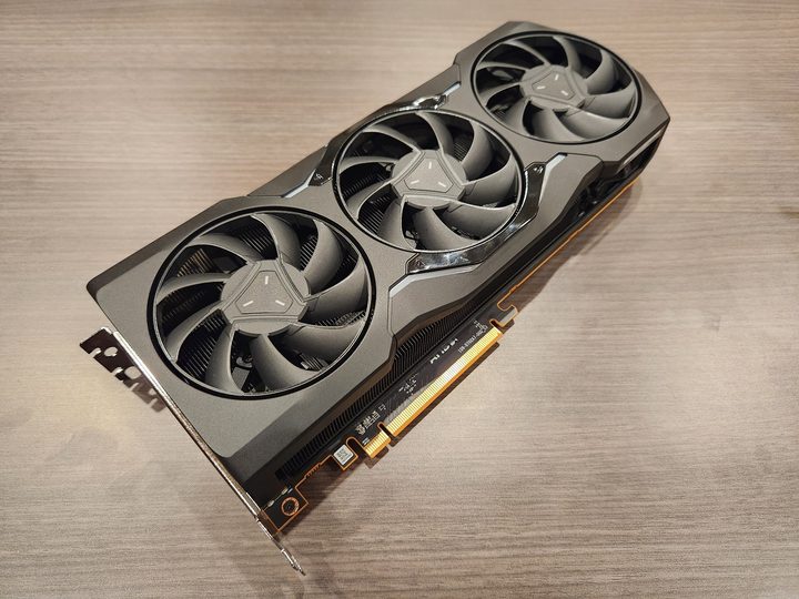 The RX 7900 XTX laying on a table.