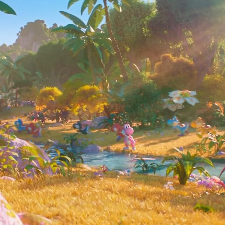 Yoshis run past a stream in The Super Mario Bros. Movie.