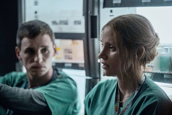 Two nurses talk to each other in The Good Nurse.