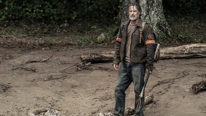 Rick standing outside wearing a CRM jacket in The Walking Dead.
