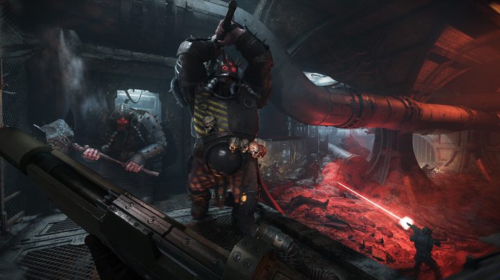 An enemy swinging at the playing in Warhammer 40K Darktide.