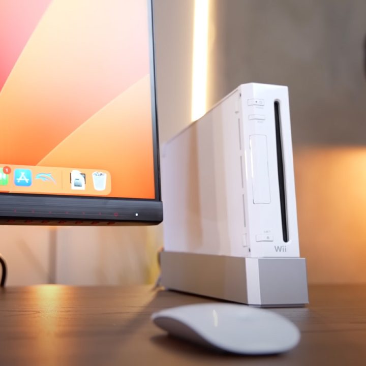 A modified Nintendo Wii, shown running macOS on a monitor.