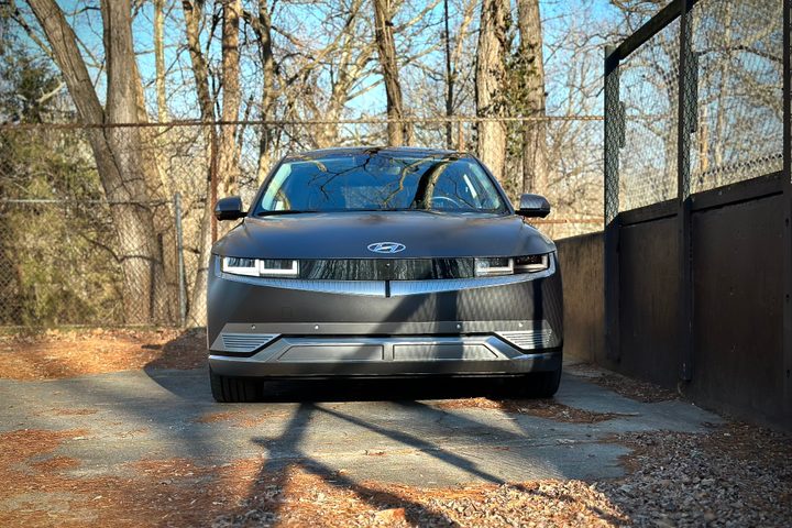 2022 Hyundai Ioniq 5 Limited AWD close up of front end with trees in the back.