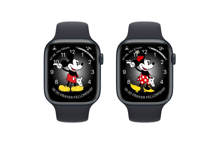 Three Apple Watches showing Mickey Mouse and Minnie Mouse watch faces.