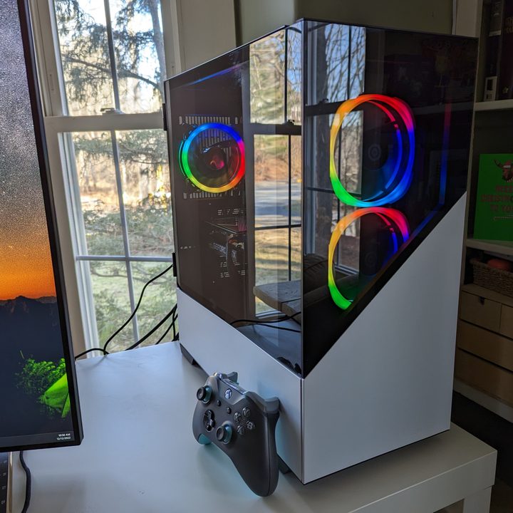CyberPowerPC on desk with RGB lighting.