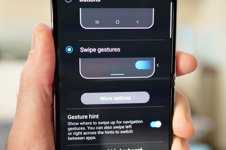 Changing the swipe gesture setting on a Samsung Galaxy phone.