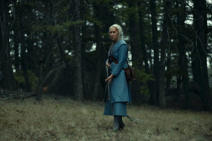 Helen Mirren holds a gun in 1923.
