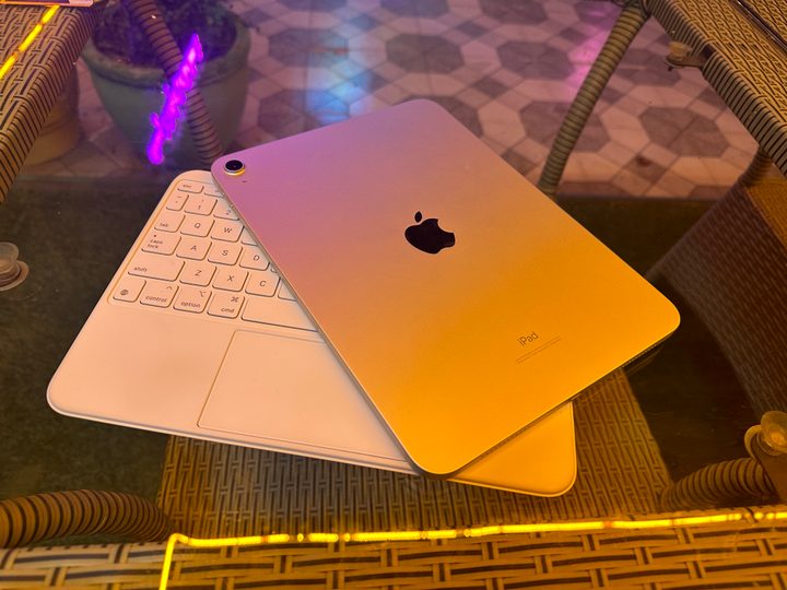 Apple iPad Gen 10 with the official keyboard accessory.