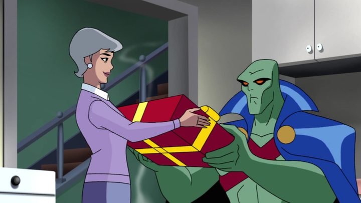 Martha Kent giving Martian Manhunter a present in Comfort and Joy.