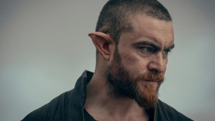 Fhall frowning and looking down in The Witcher: Blood Origin.