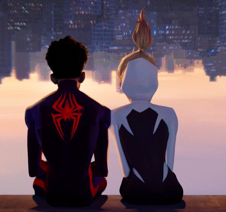 Two teens hang upside in a scene from Spider-Man: Across the Spider-Verse.