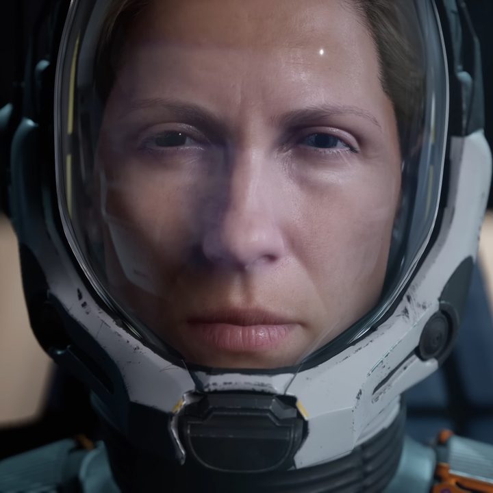 Screenshot from Sony's Returnal, showing a woman wearing a spacesuit.
