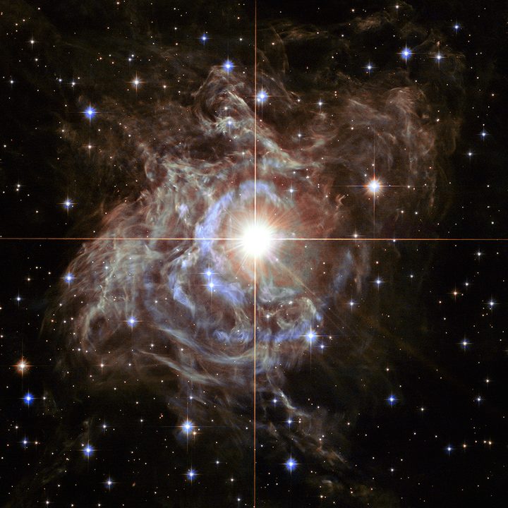 This festive NASA Hubble Space Telescope image resembles a holiday wreath made of sparkling lights.