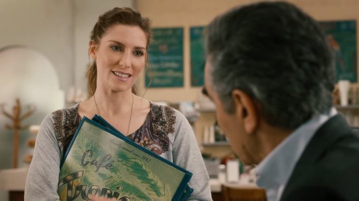 Twyla smiling at Johnny in "Schitt's Creek."