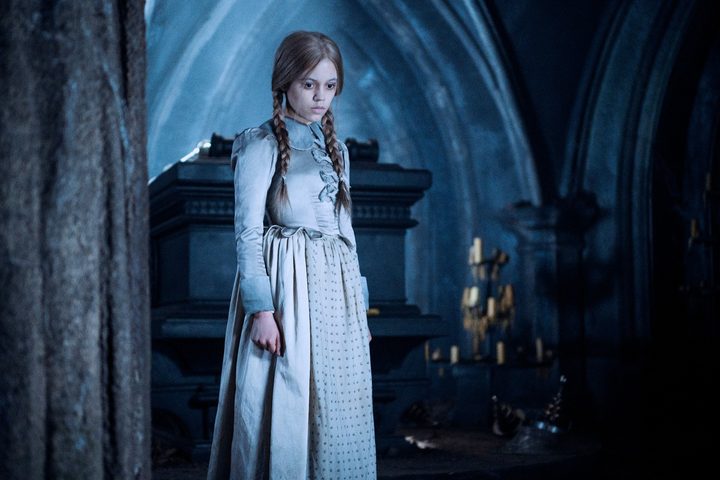 A ghostly girl stands in Wednesday.