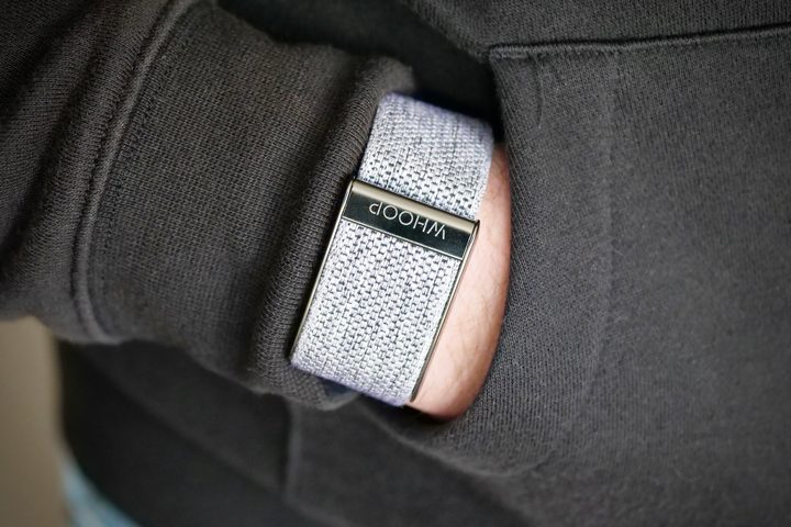 The Whoop 4.0 on a person's wrist.