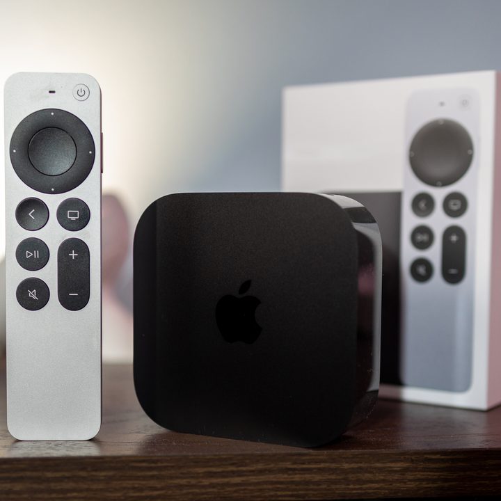 Apple TV 4K hardware with remote and retail box.