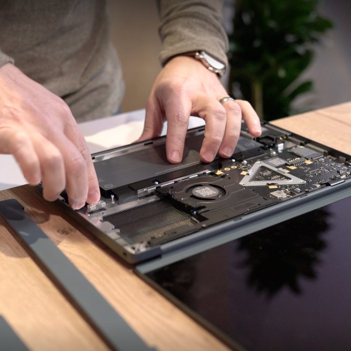 Someone taking apart a Dell Concept Luna laptop.