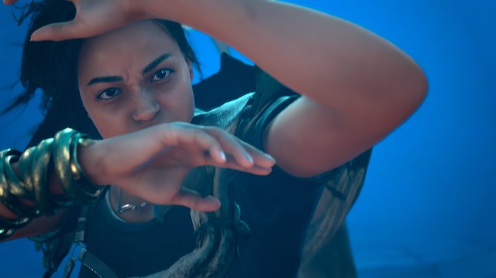 Frey shields her face with her arms in Forspoken.
